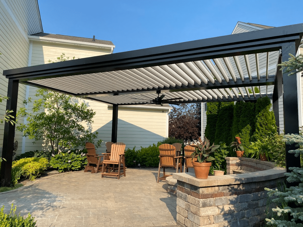 louvered roof pergola serving as a patio cover - Patio Covers installation services near me in st louis missouri - Patio Builders